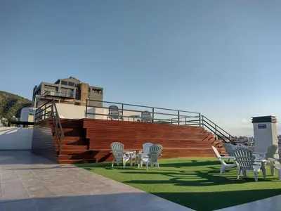 a group of chairs and a table on a roof at Dto a estrenar Ctro V Carlos Paz in Villa Carlos Paz