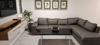 a living room with a couch and a table at Semipiso 3 Dormitorios 2 Baños Nueva Córdoba in Cordoba