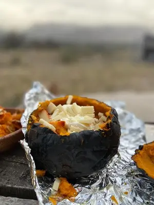 a black avocado with cheese on tin foil at Descanso, aventura y ecoturismo en las sierras in San Francisco del Monte de Oro
