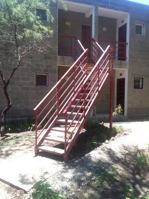 a set of stairs in front of a building at Paraiso Serrano in La Población