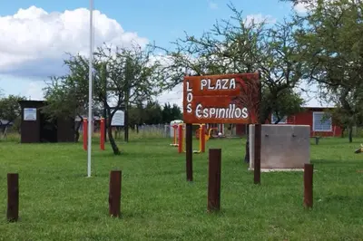 a sign that says pizza and sandwiches in a field at Cabaña El Escape, Potrero de Garay, B del LAgo,600m del lago in Potrero de Garay