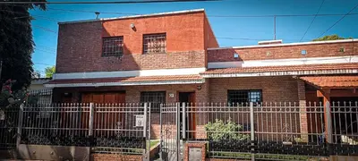 a brick building with a fence in front of it at Departamento HOSPITAL PRIVADO - QUALITY - 