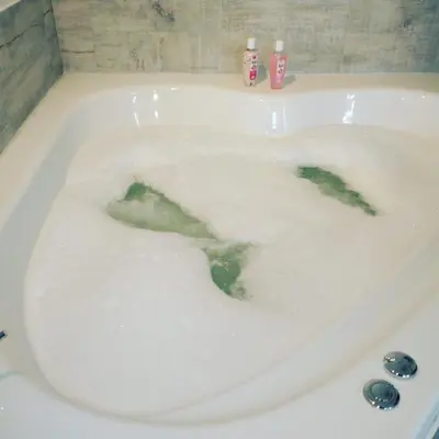 a bath tub filled with dirty water in a bathroom at Sierras Alojamiento SUITE in Mina Clavero