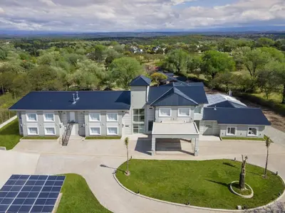 an aerial view of a house with a solarium at StradivariuS Hotel Boutique in Villa General Belgrano