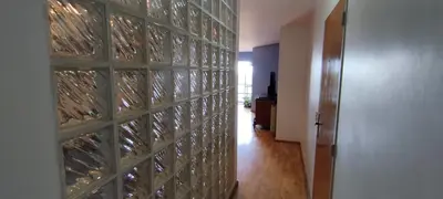 a hallway with a wall of glass wine bottles at Nueva Córdoba departamento de una habitacion con vista al Parque in Cordoba