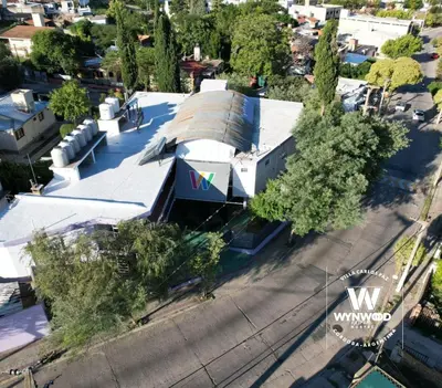 an overhead view of a house with a roof at Wynwood Extreme Hostel in Villa Carlos Paz