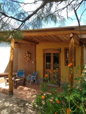 a house with a patio and a table and chairs at Hexágono de San Javier in San Javier