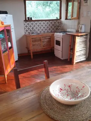 a kitchen with a table with a bowl on top of it at Hexágono de San Javier in San Javier