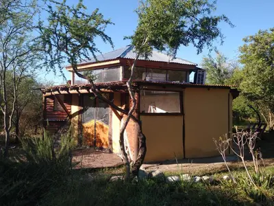 a small house in the middle of a forest at Hexágono de San Javier in San Javier