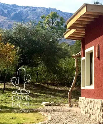 a sign for a cederocooco sign next to a building at Color Local Cabañas in San Javier