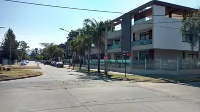 a street with a building on the side of a road at Lake360 Dto 51 in Villa Carlos Paz