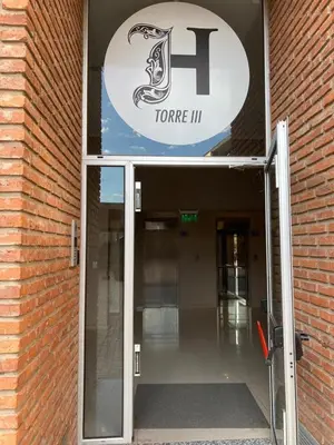 an entrance to a torre iii building with an open door at TORRES H in Cordoba
