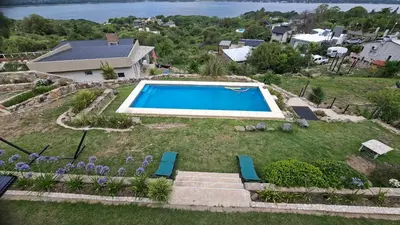 an aerial view of a backyard with a swimming pool at El Mirador de los Manantiales in Villa Parque Siquiman
