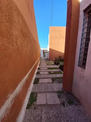 an alleyway between two buildings in a courtyard at Monserrat in Cordoba