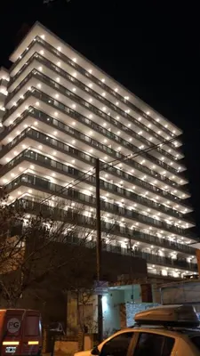 a large building with lights on it at night at Edificio Leonardo 6to piso in Villa Carlos Paz