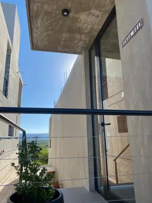 a view from the window of a building at Sol Suites in Villa Cura Brochero