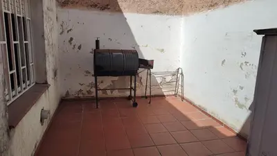 a room with a tiled floor in a building at Habitación Privada en casa compartida, para mujeres, parejas, grupo mixto in Cordoba