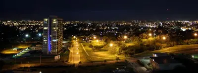 a view of a city at night with lights at Hotel Cardiólogico in Cordoba