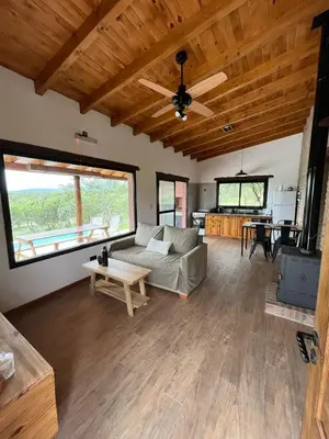 a living room with a couch and a table at La Peperina in San Javier