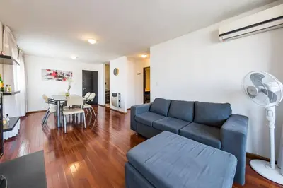 a living room with a couch and a table at Lima 823 B General Paz in Cordoba