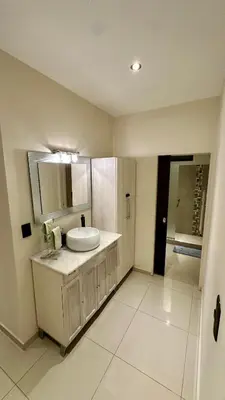 a bathroom with a white sink and a mirror at Atlantico in Cordoba