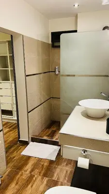 a bathroom with a sink and a toilet in it at Atlantico in Cordoba