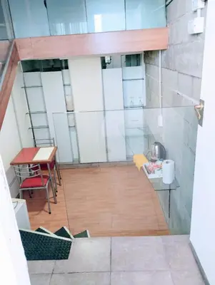a view of a room with a table and a tablektop at Duplex-Loft in Cordoba