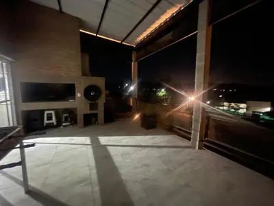 a view of a living room at night at CHALET DE SIQUIMAN in Villa Parque Siquiman